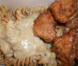 Bouchées de Poulet pâné et ses Torsades sauce Courgette Parmesan