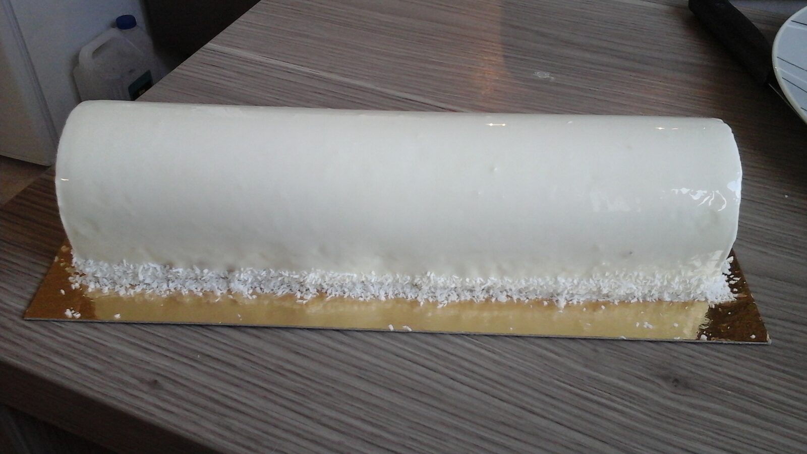 Bûche coco insert lemon curd et crémeux fruits rouges