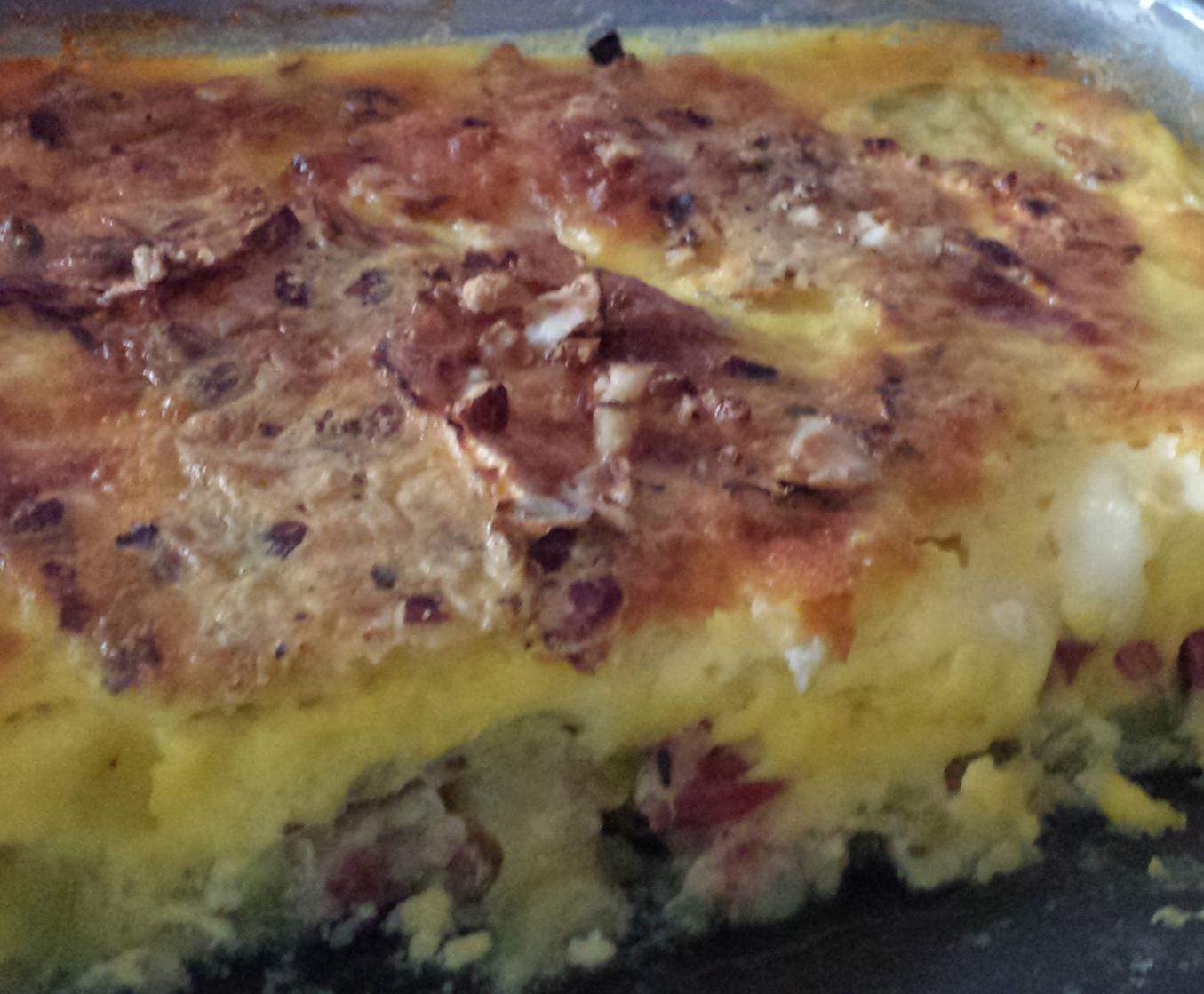 Clafoutis aux courgettes, lardons, chèvre et noisettes
