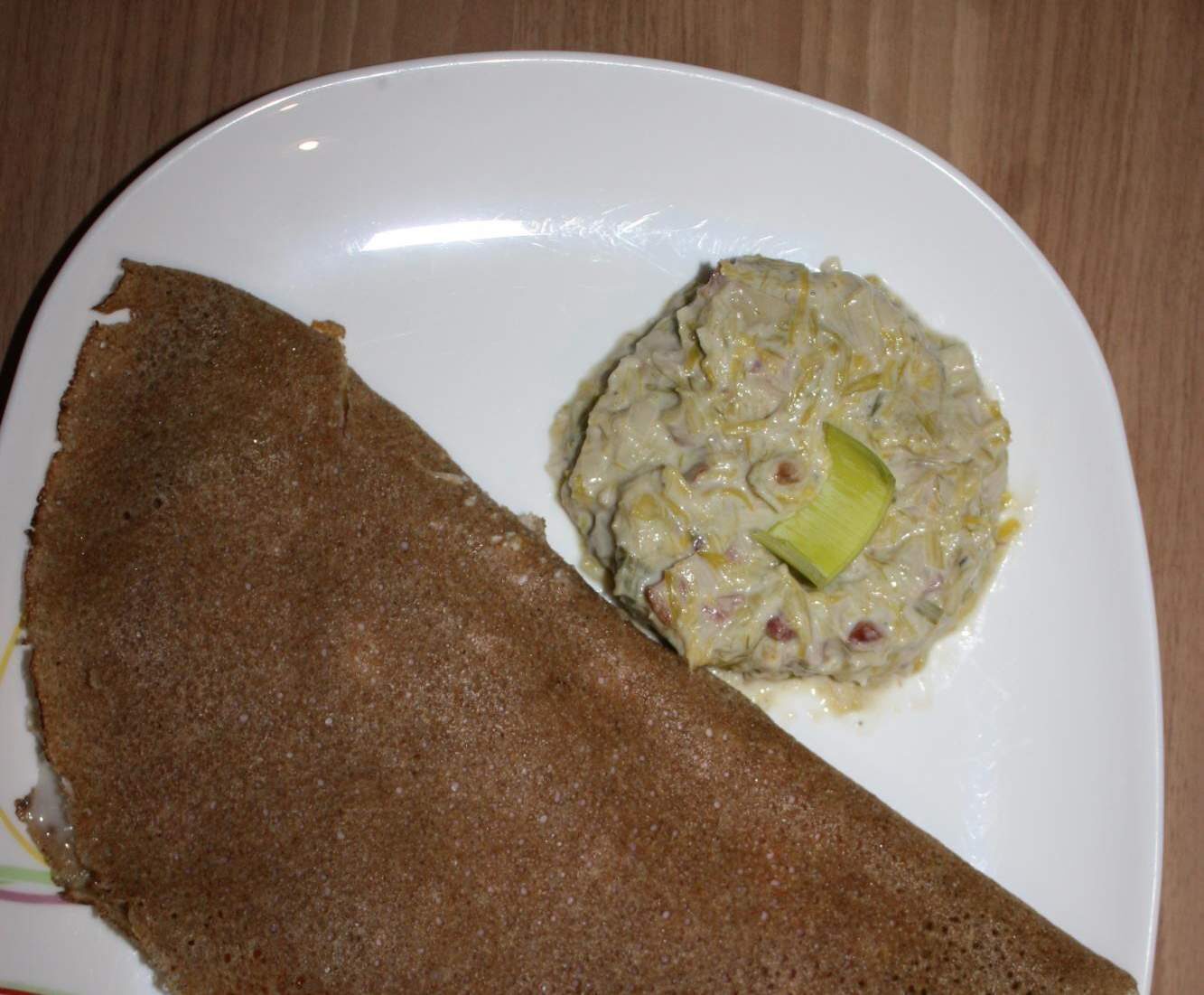 Fondue de poireaux, lardons, noix crème de roquefort