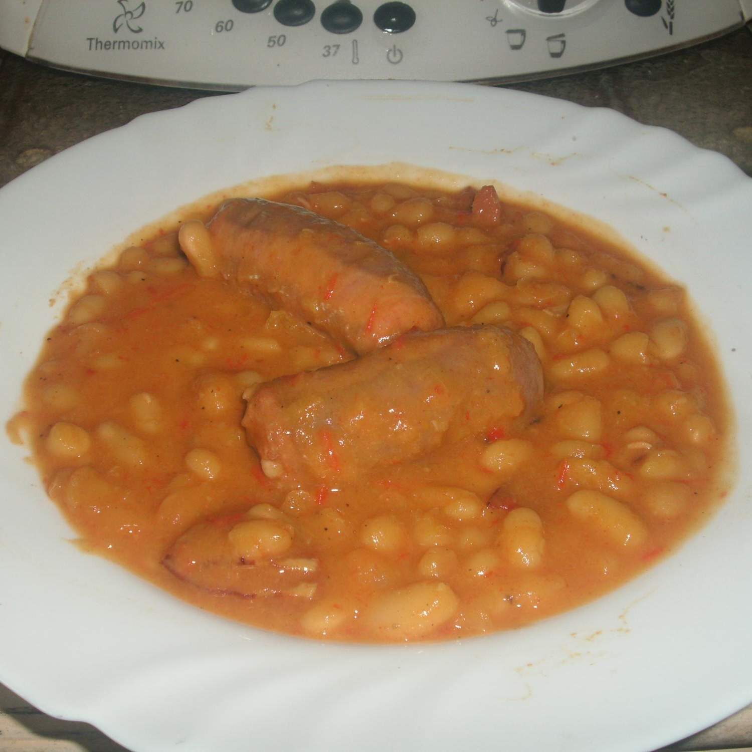 Haricots blancs et sa saucisse en ragout