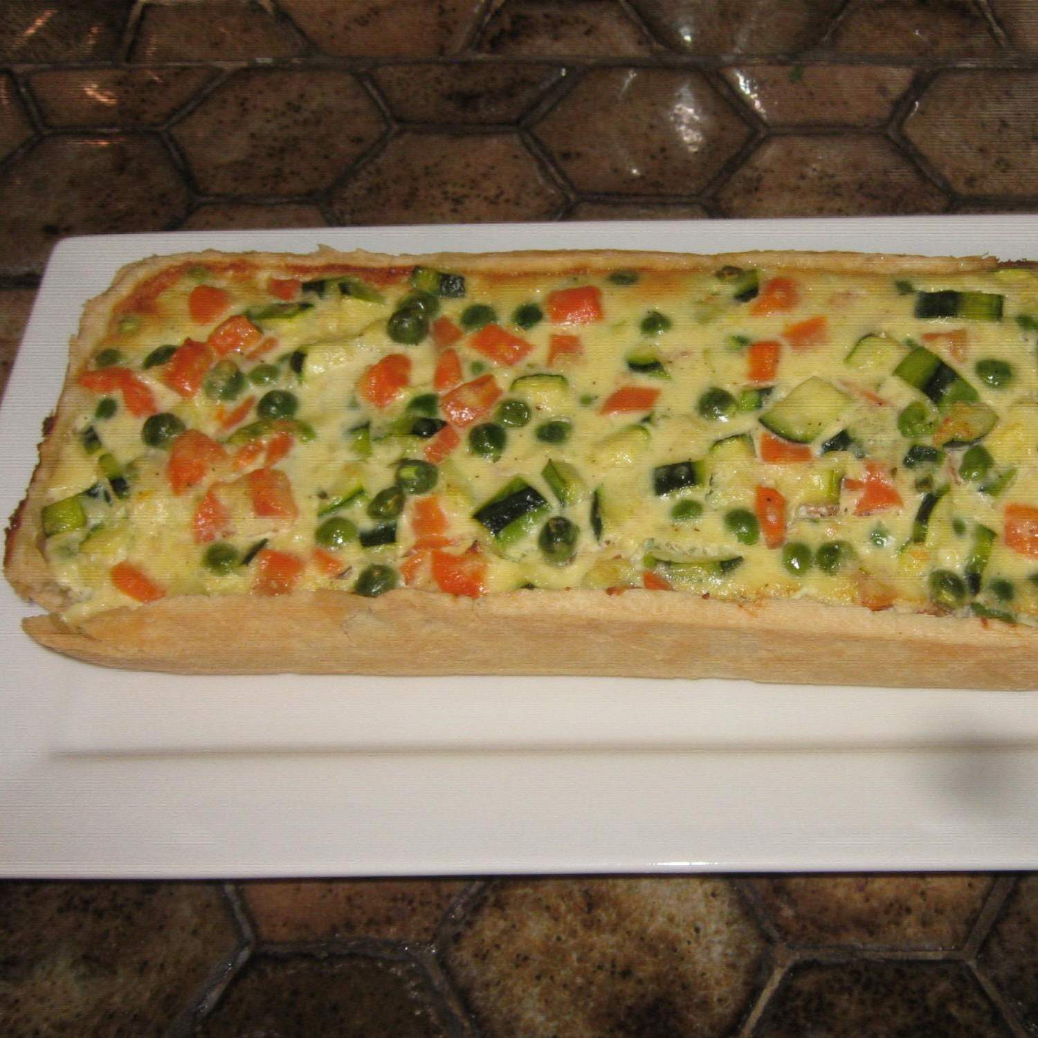 Quiche aux légumes colorés en terrine